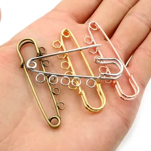 Vue détaillée d'épingles à broche DIY avec 5 anneaux en finitions bronze, or et argent