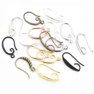 Assorted DIY jewelry ear hooks in various metal finishes for handmade earring making