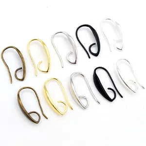 Assorted copper plated DIY earring hooks in various metallic finishes on white background