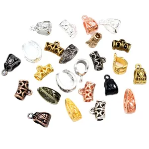 Assorted DIY jewelry charms connectors in various metal finishes for necklaces making