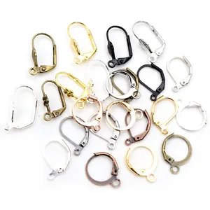 Close-up of assorted lever-back earring hooks in gold, silver, and rose gold plating