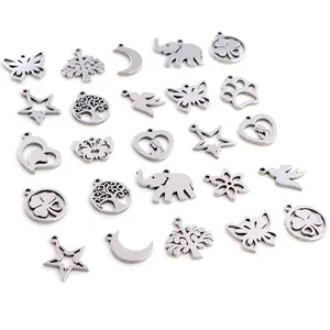 Assorted stainless steel mini charms including moon, tree, and butterfly for DIY jewelry