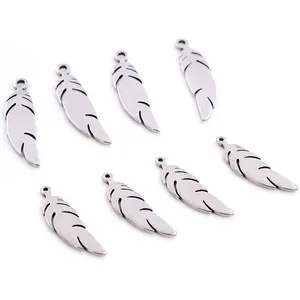 Set of eight stainless steel feather pendants for DIY jewelry making in silver finish