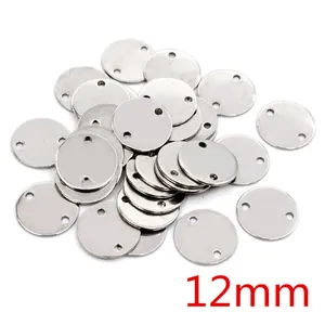 Stack of 12mm stainless steel double-hole round disc charms for DIY jewelry making