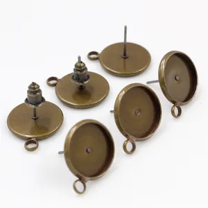 Detailed view of antique bronze plated copper earring studs with hanging loops for DIY