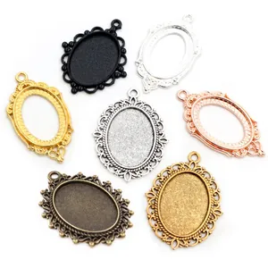 Oval 18x25mm cameo pendant settings in seven metallic finishes with vintage lace edges