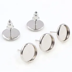 Macro detail of silver stainless steel flat tray ear stud posts for DIY jewelry