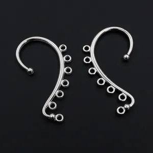 Detail of silver metal DIY earring hooks with seven loops for jewelry making
