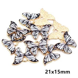 Detail showing 21x15mm butterfly charms with black and white enamel for DIY jewelry