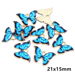 Detailed front and back view of 21x15mm gradient blue butterfly pendants for DIY jewelry