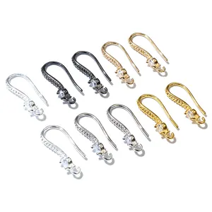 Detail of cubic zirconia paved earring hooks in silver gold and black finishes