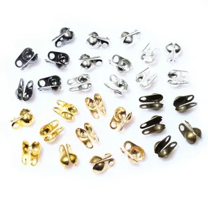 Assorted DIY jewelry end crimp beads in gold, silver, bronze and black finishes
