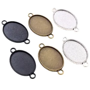 Pendentifs ovales 18x25mm en alliage noir, bronze et argent pour la création de bijoux DIY