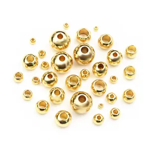 Various sizes of polished gold stainless steel spacer beads with through holes for jewelry DIY