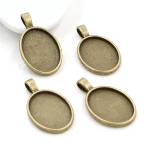 Lot de 4 supports de pendentif ovales 18x25mm en bronze antique pour création de bijoux