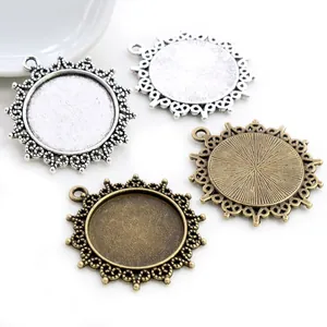 Macro view of 25mm vintage round lace alloy pendant trays in four metallic colors for DIY jewelry
