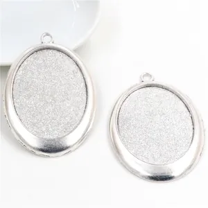 Base per ciondolo ovale in lega argento antico per gioielli DIY con trama glitterata