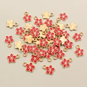 DIY flower charm pendants in red oil-dripped metal for handmade jewelry making