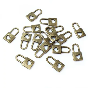 Antique bronze heart cutout lock charms made of alloy for DIY jewelry and crafts