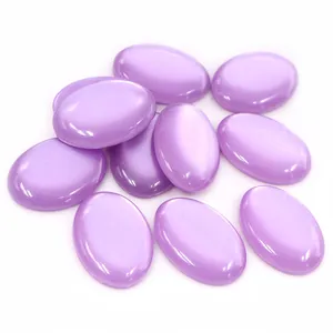 Detailed view of 18x25mm oval purple resin cabochons with cat eye effect for DIY jewelry