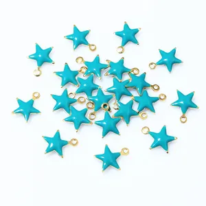 Detailed view of small star-shaped stainless steel charms with blue enamel finish