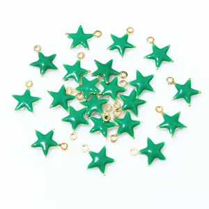 Green enamel star pendants with gold trim and top rings for DIY jewelry making