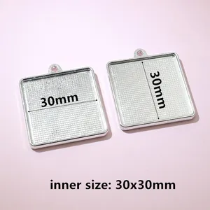 Detail of 30x30mm square silver alloy pendant tray for jewelry DIY and resin projects