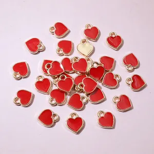 Mini red heart charms with gold plating and enamel finish for DIY jewelry making