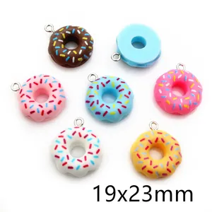 Detailed view of colorful 19x23mm resin donut charms with sugar coating for DIY jewelry