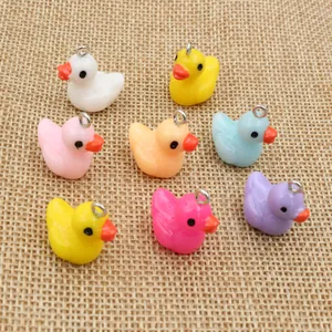 Set of 8 colorful resin duck pendants in various shades for DIY jewelry making crafts