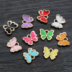Zehn bunte Schmetterlingsanhänger aus Goldlegierung und Emaille für DIY Schmuck