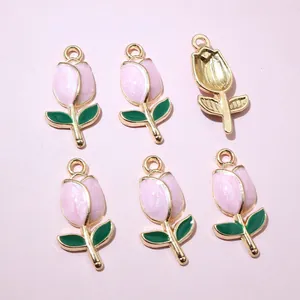 Detail view of 6 tulip flower enamel charms with gold metal base for DIY jewelry making