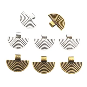 Fan-shaped alloy pendants with concentric textures in silver and bronze for DIY jewelry