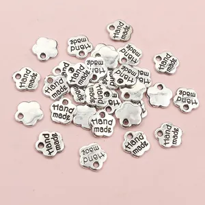 8mm silberne Blumenanhänger mit 'Hand made' Gravur für DIY-Schmuckherstellung