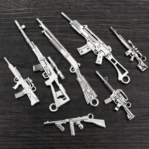 Set mit sieben Vintage-Silberlegierung-Gewehranhängern für DIY-Schmuck und Schlüsselanhänger