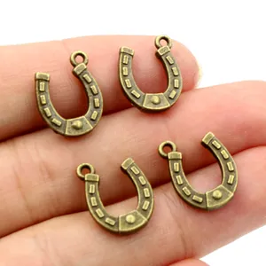 Set of 4 vintage bronze horseshoe pendants for DIY jewelry making and handmade crafts