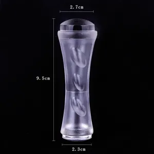 Dual-ended clear acrylic nail stamper tool with hourglass handle and dimension markings