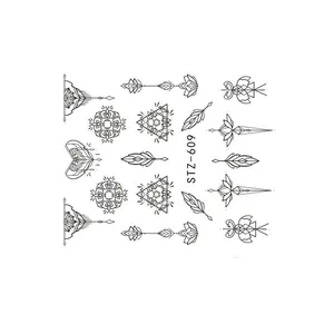 Détail macro des stickers ongles STZ-609 avec lignes géométriques noires et motifs mandalas