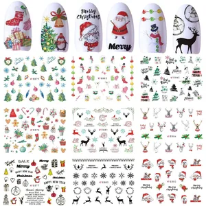Detailed sheet of Christmas nail art stickers featuring Santa, reindeer and snowflakes