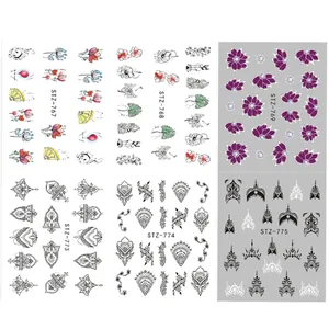 Vue détaillée de six planches de stickers nail art avec roses mauves et motifs feuilles