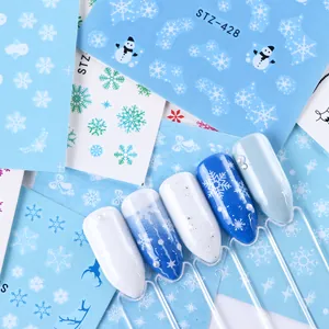 Winter Christmas nail water decals with snowflakes, elk, and snowman patterns in blue white