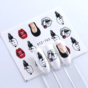 Macro detail of STZ-763 nail water decals featuring pop art lips and artistic cherry patterns