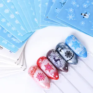 Christmas and Halloween nail water sliders with snowflakes, deer and holiday greetings