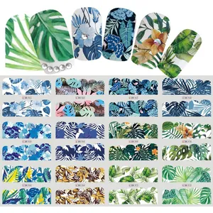 Pegatinas de uñas tropicales con hojas de monstera y diseños florales en acuarela