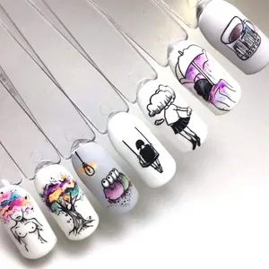 Artistic nail stickers featuring lips, girls, and trees on professional display tips