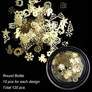 Detailed macro view of 120pcs gold Christmas nail metal sequins in a clear round box