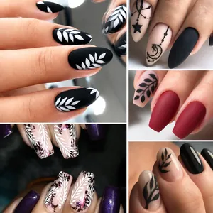 Close-up of matte nail stickers with floral patterns, vine leaves and cosmic moon designs