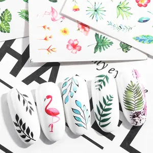 Tropical nail stickers set with pink flamingo and green palm leaf designs for art