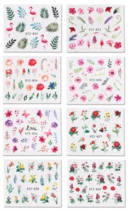 Flat lay showing 8 sheets of floral and flamingo water slide nail art stickers