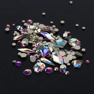 Macro detail of mixed AB crystal rhinestones in various shapes for DIY nail art design